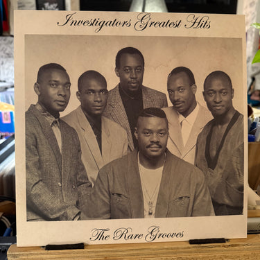 INVESTIGATORS <br> GREATEST HITS