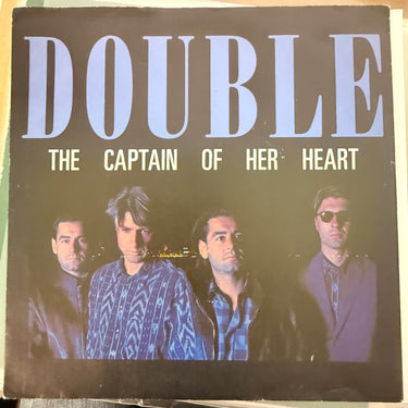 DOUBLE <br> THE CAPTAIN OF HER HEART