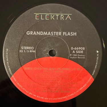 GRANDMASTER FLASH <br> GIRLS LOVE THE WAY HE SPINS