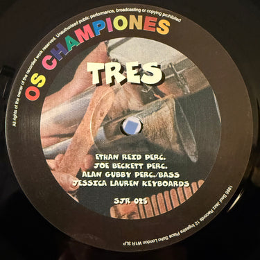 OS CHAMPIONES <br> UM DOIS TRES