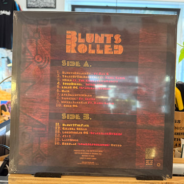 RAS G <br> BLUNTS ROLLED