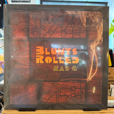 RAS G <br> BLUNTS ROLLED
